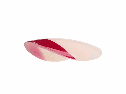 RaveGrip proprietary nail mold showing the custom shape and textured backing